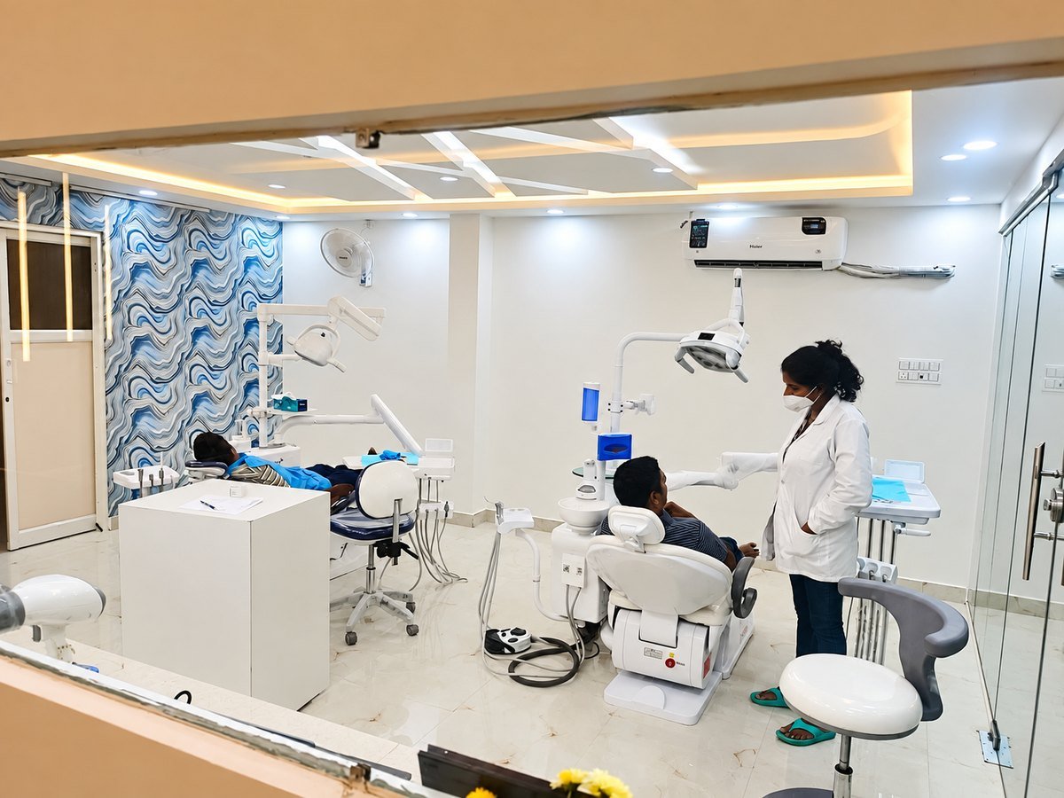 A clinician treating patients in the Dental Fit treatment room